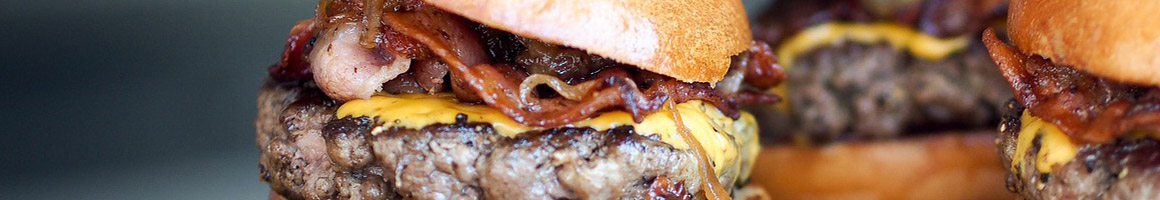 Eating Burger at JC's Burger Bar restaurant in Mesquite, TX.